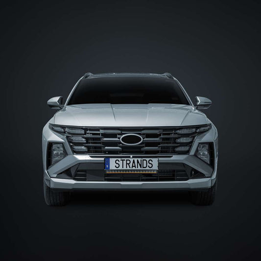 Hyundai Tucson with Strands NUUK D-LINE 20-inch LED driving light bar installed, showcasing slim LED design for enhanced visibility.